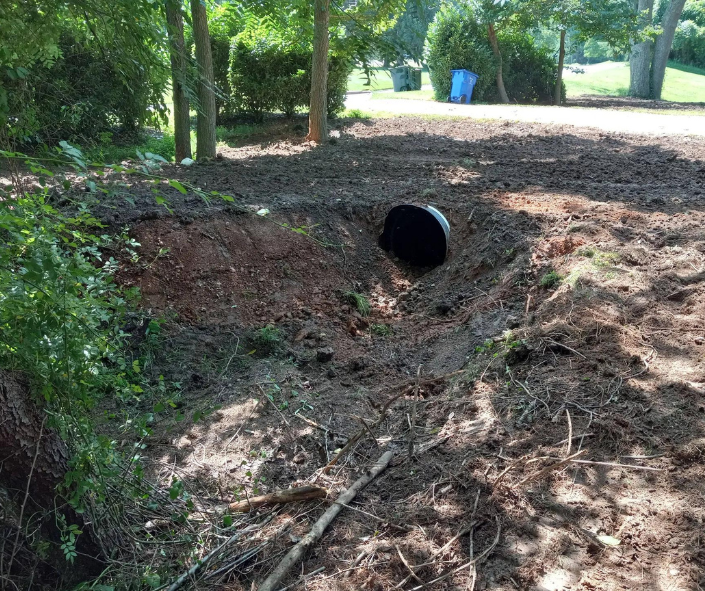 a drainage pipe under a driveway